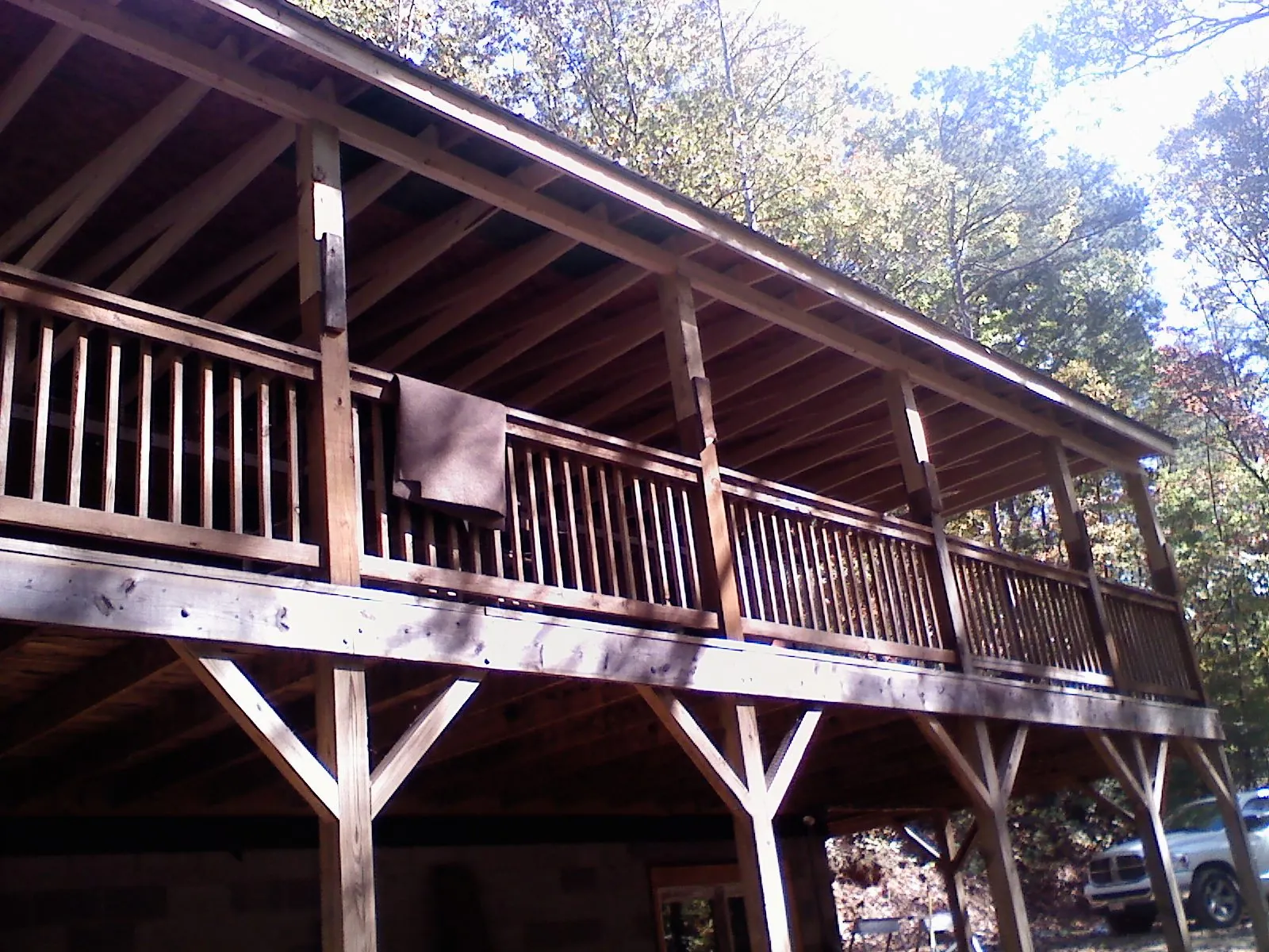 Timber framing under a new elevated porch and deck — Roof Leak Repair in Bee by Roofing Brothers